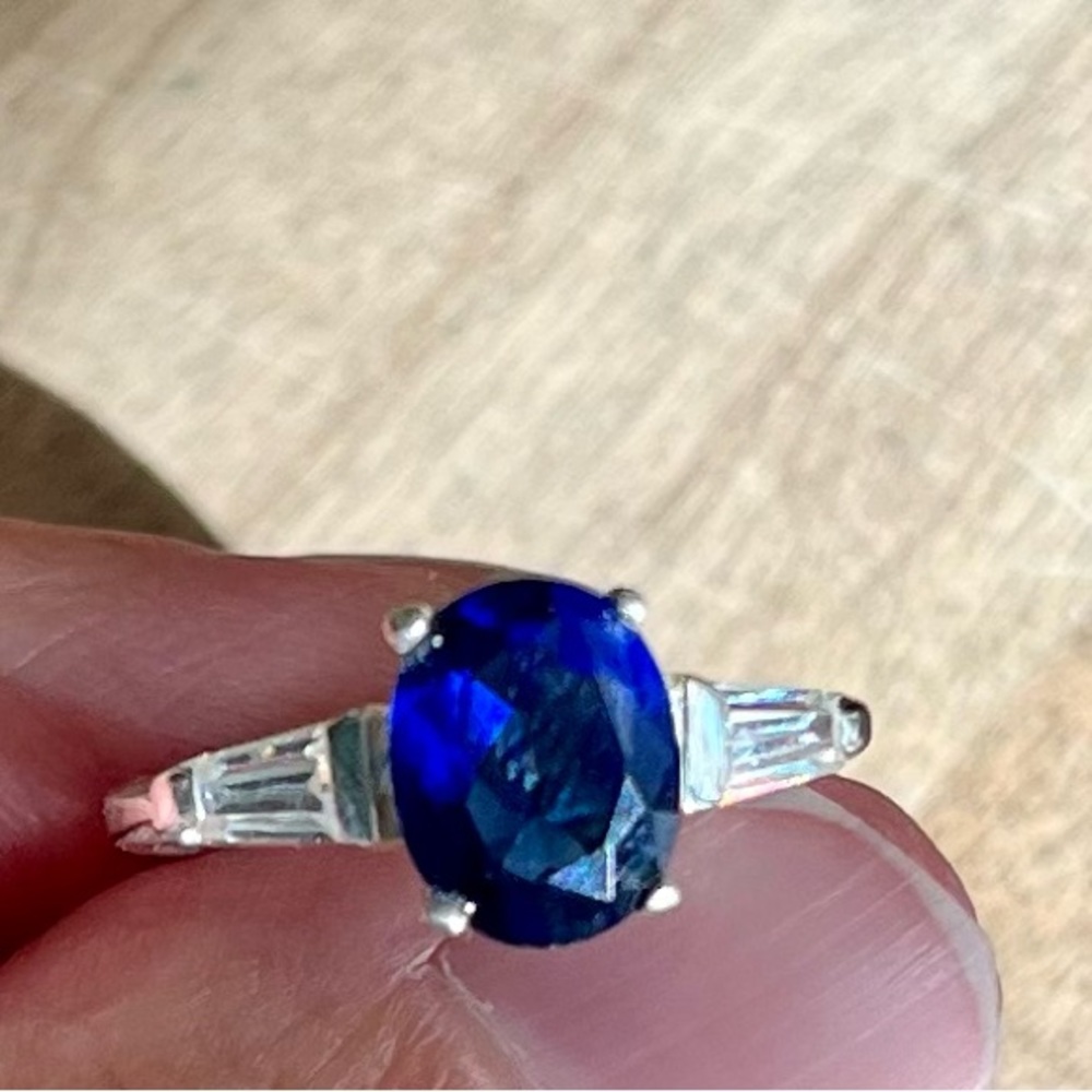 Sterling silver engagement promise ring w/oval sapphire center and cz accents
